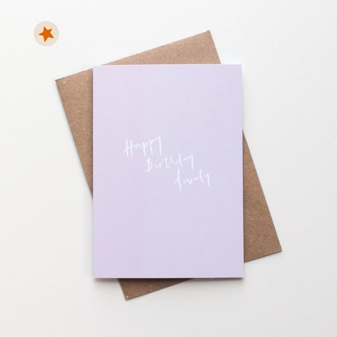 Light pink card with the words &quot;Happy Birthday Lovely&quot; in white scribbled text.