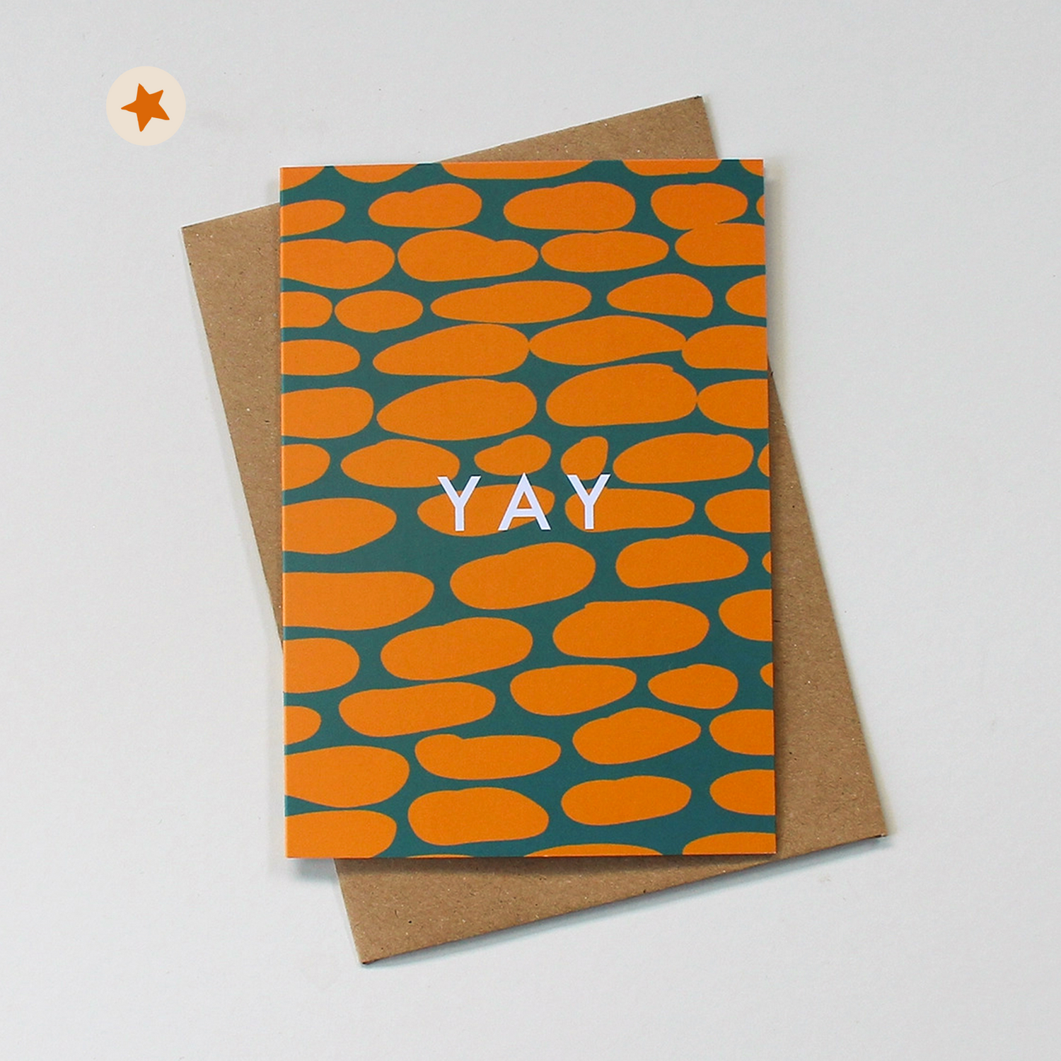 Teal card with an orange abstract circle pattern and the words &quot;Yay&quot;